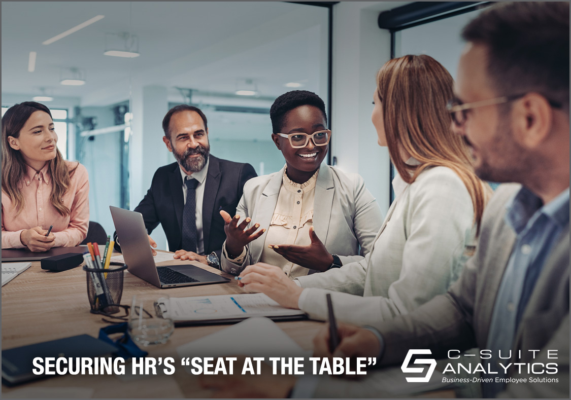 HR exec with seat at table.