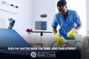 Hospital worker cleaning beds