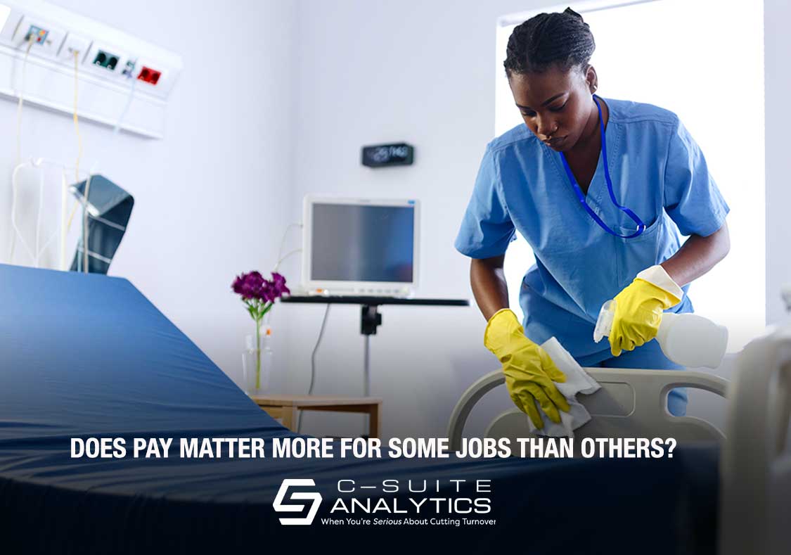 Hospital worker cleaning beds